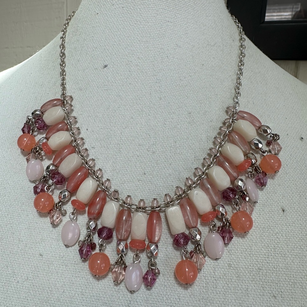 Silvertone Drippy dangle necklace with pastel peach beads